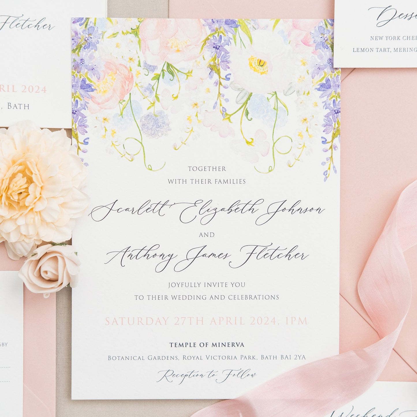 Wedding invitations customised with guest names, wildflowers and wisteria
