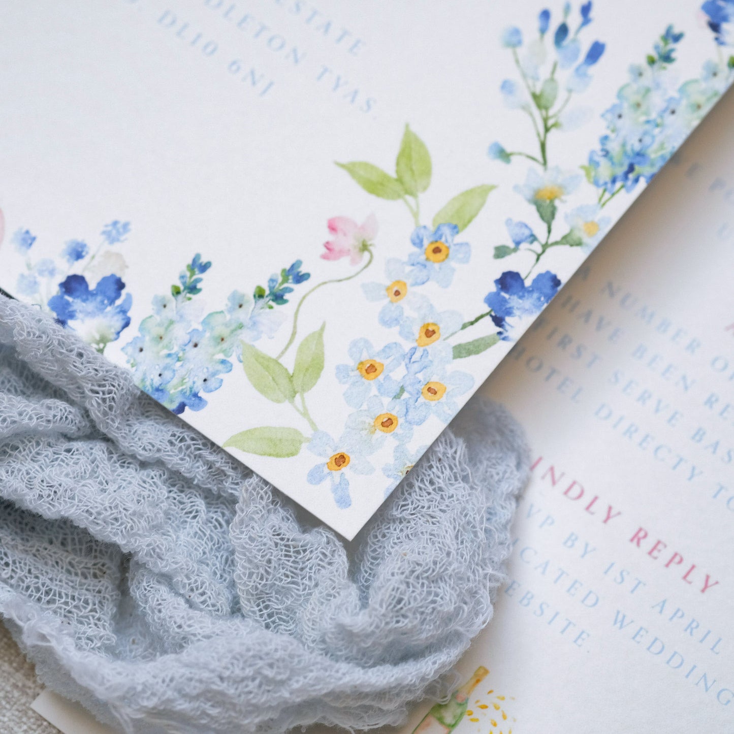 Blue wildflower hand illustrated wedding invitation, floral border