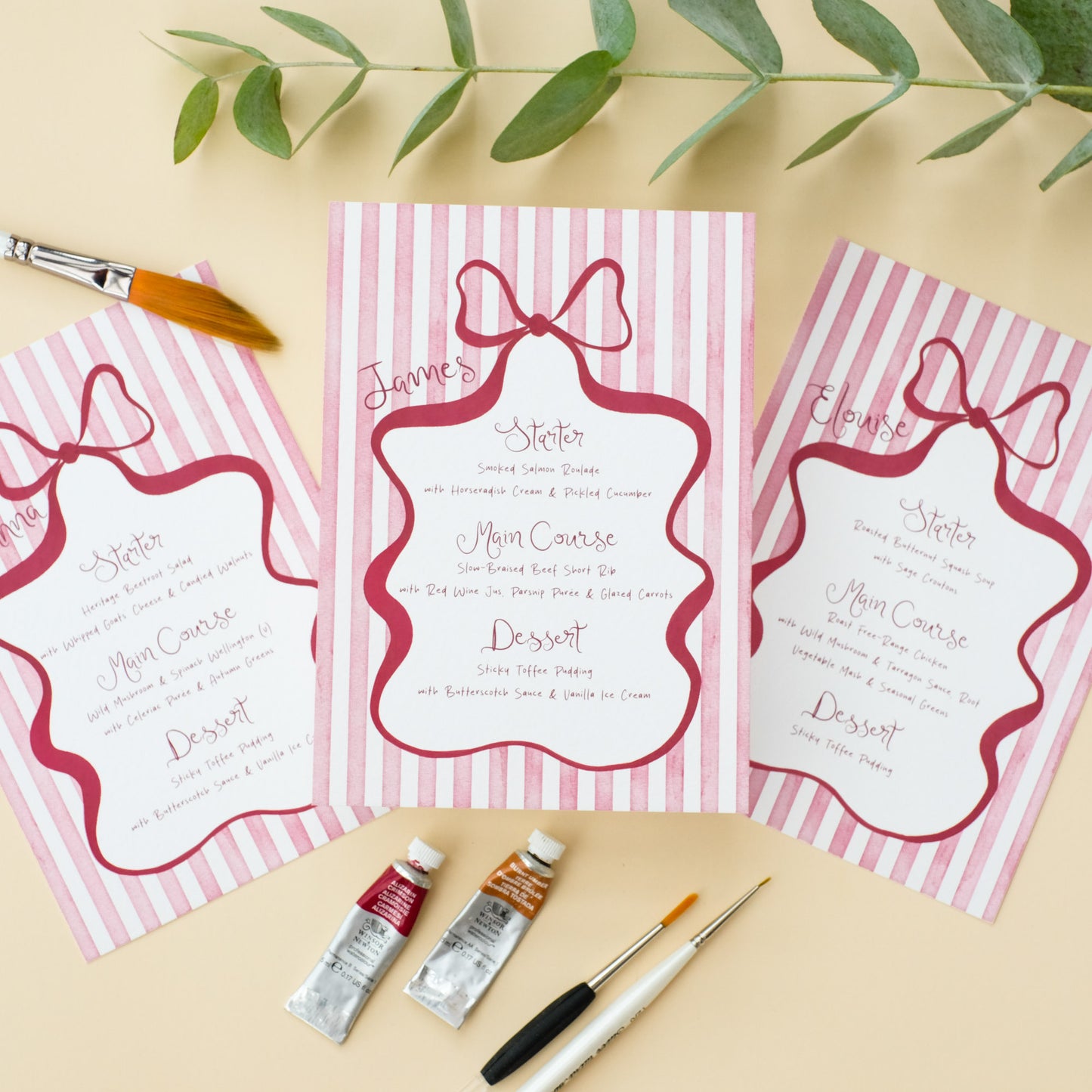 wedding menu with white and burgundy stripes with bow