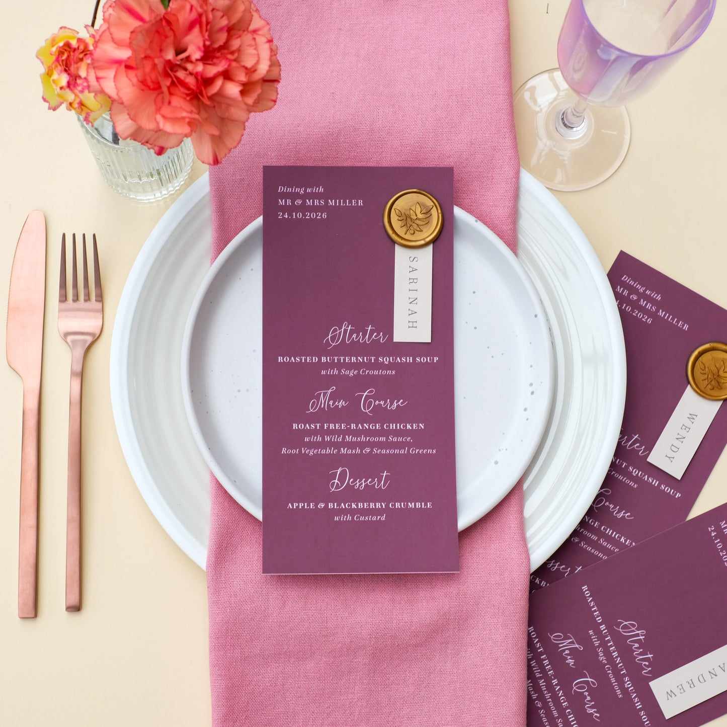 burguny wedding menu with guest name and wax seal