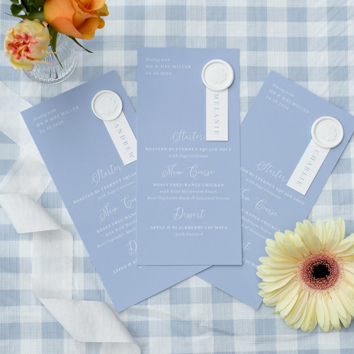 dusty blue wedding menu with guest name