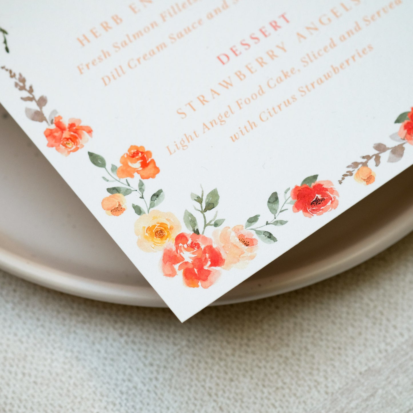Orange wedding menu with painterly style wildflower border