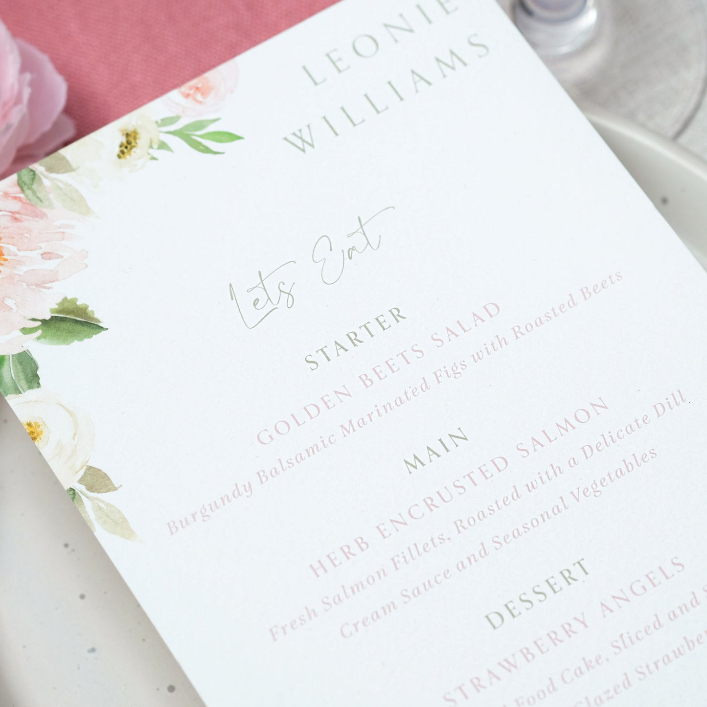 Floral illustrated wedding menu personalised with guest name