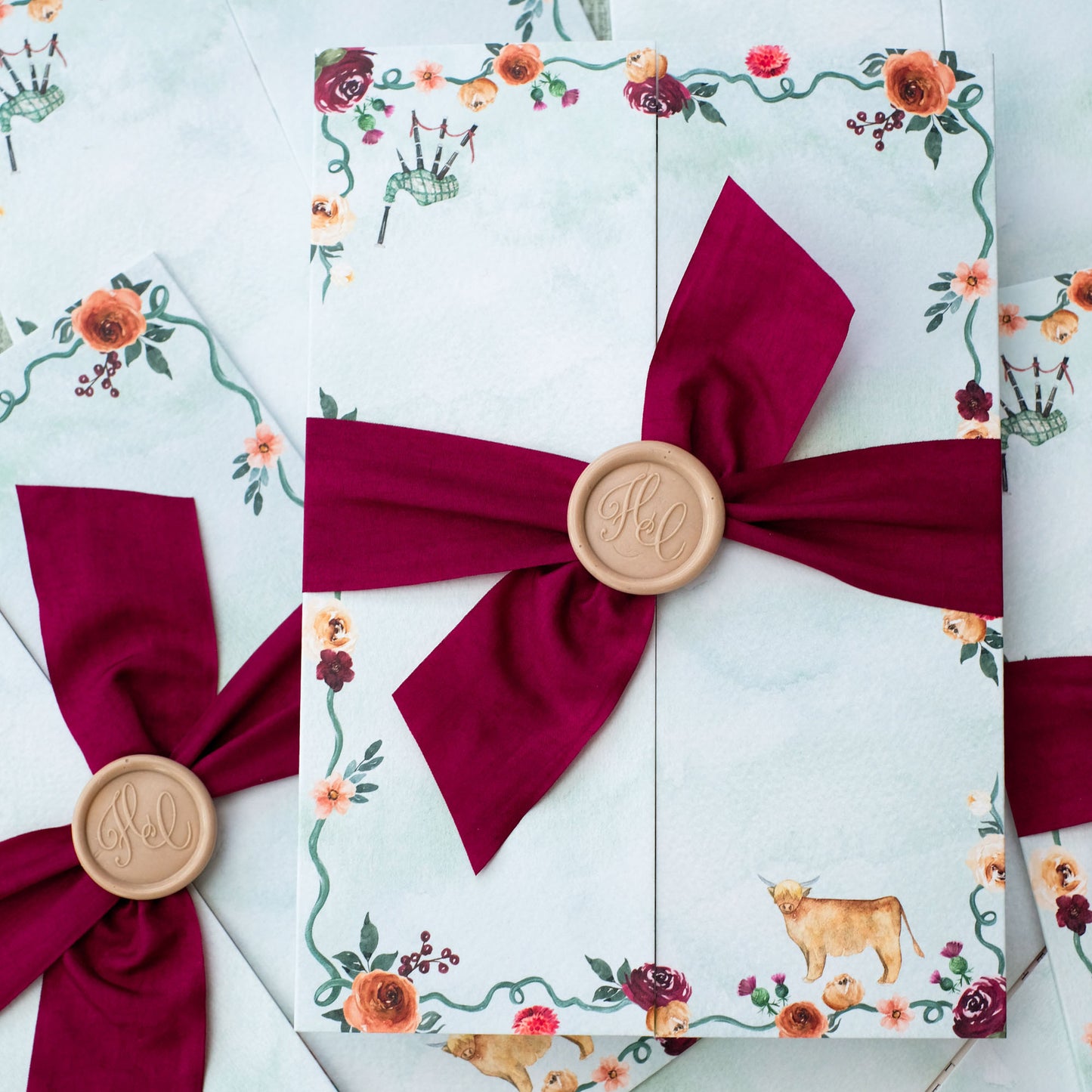 Custom barn wedding invitations with ribbon and wax seals
