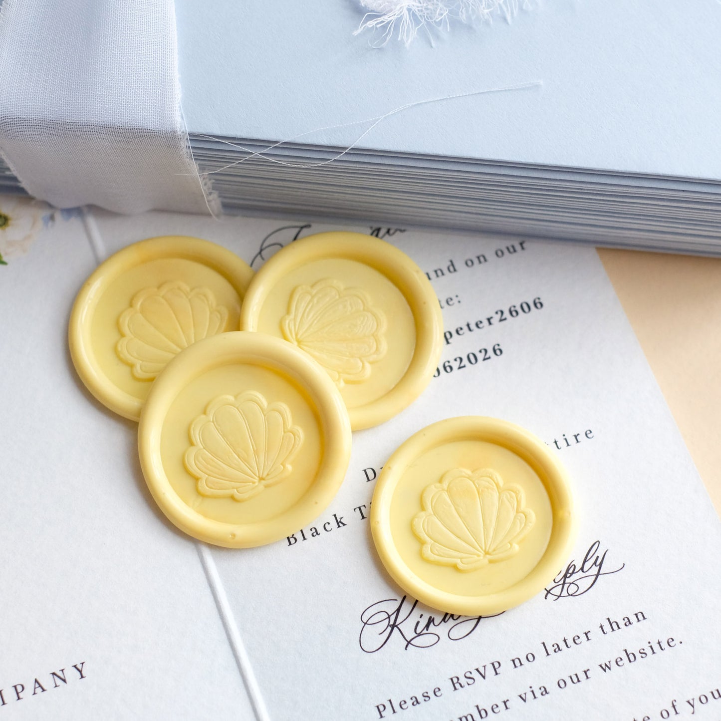 Lemon yellow wax seals with shell stamp