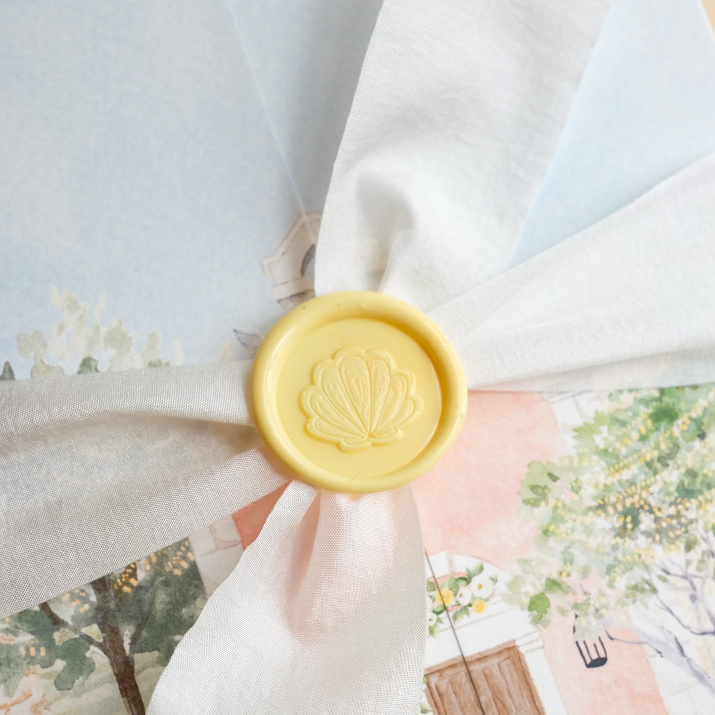 Lemon yellow wax seal with shell stamp