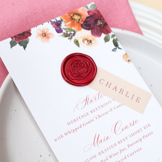 personalised wedding menu keepsake with guest names and autumn flowers