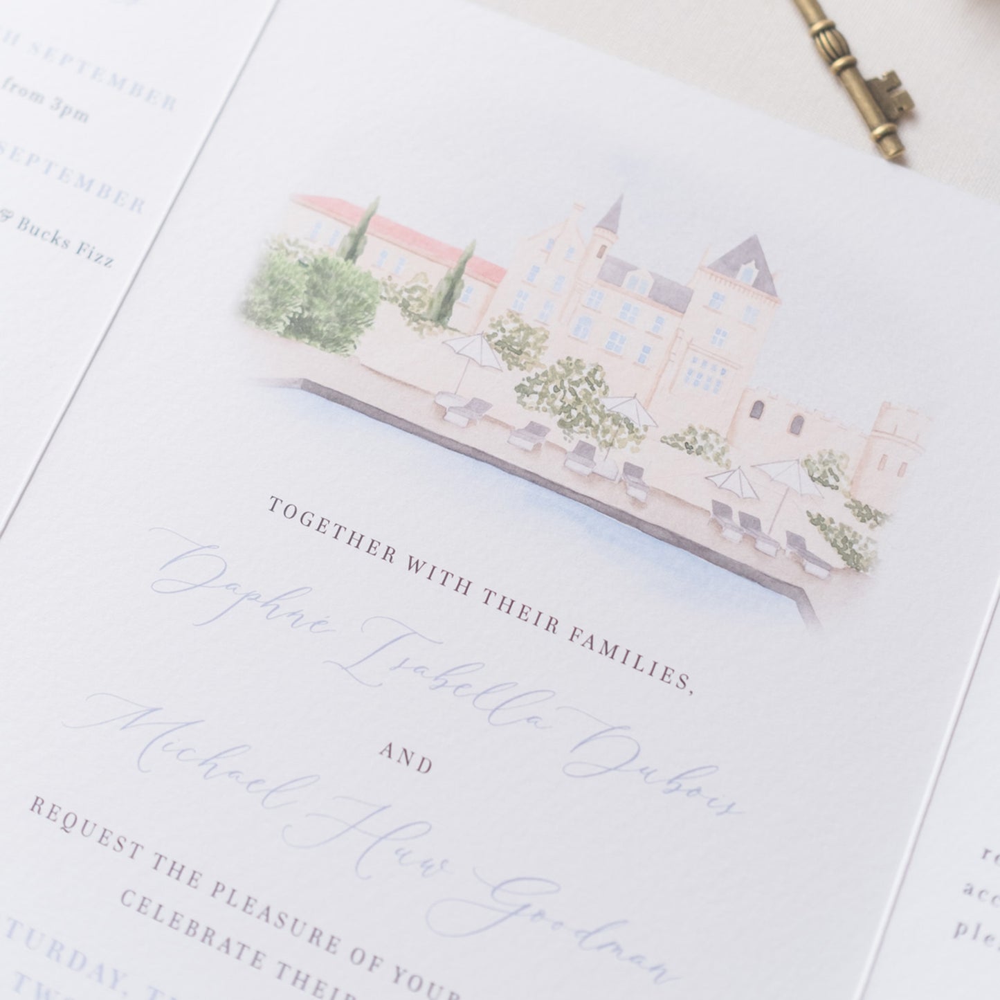 Blue chateau folded wedding invitation with custom venue illustration