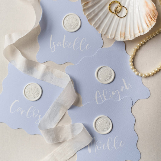 Wavy Shaped Place Cards with shell wax seal