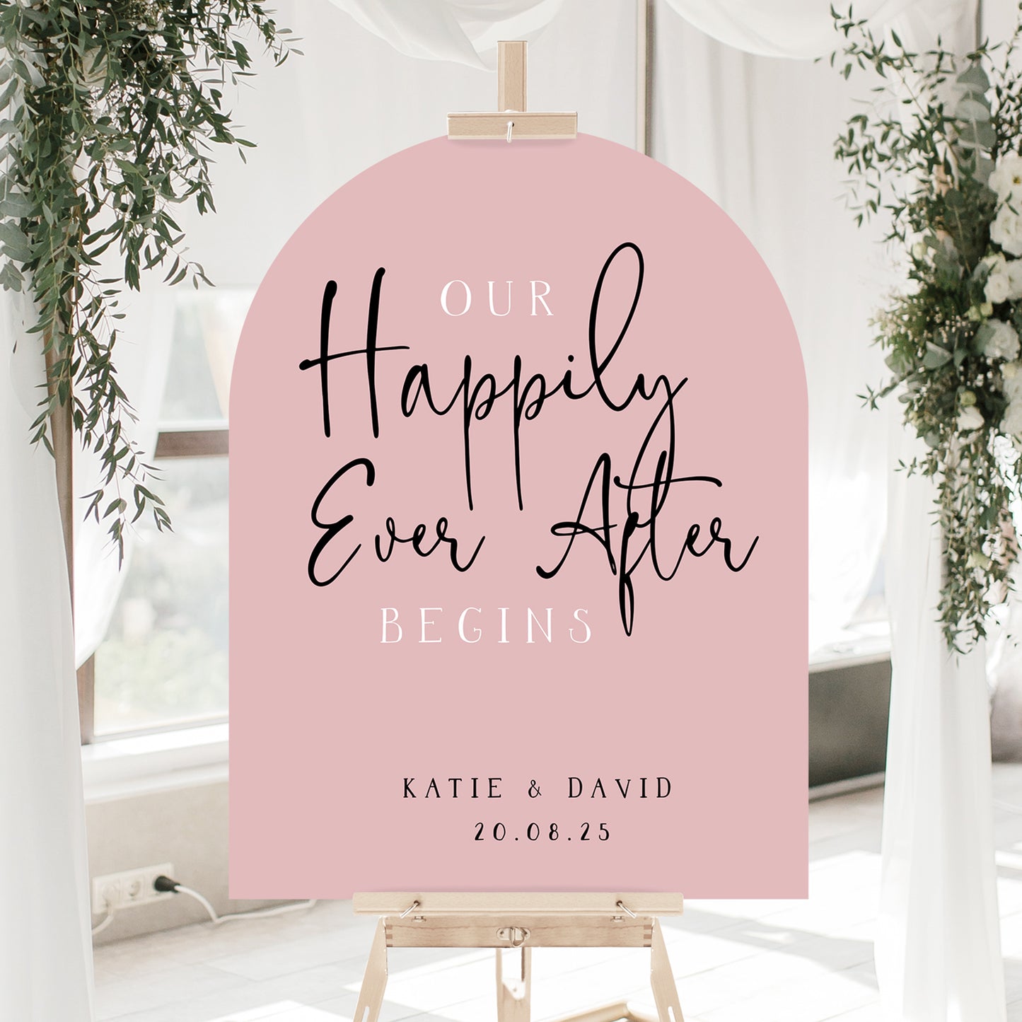 Pink arched wedding sign with quote