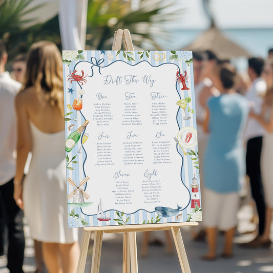 Coastal wedding table plan with lobsters and blue stripes