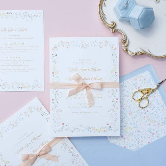 vintage style floral wedding invitation with elegant floral border