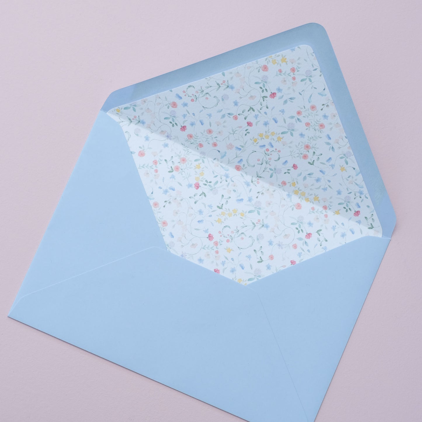 blue envelope with floral envelope liner