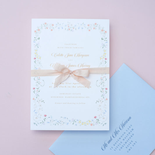 vintage style floral wedding invitation with elegant floral border