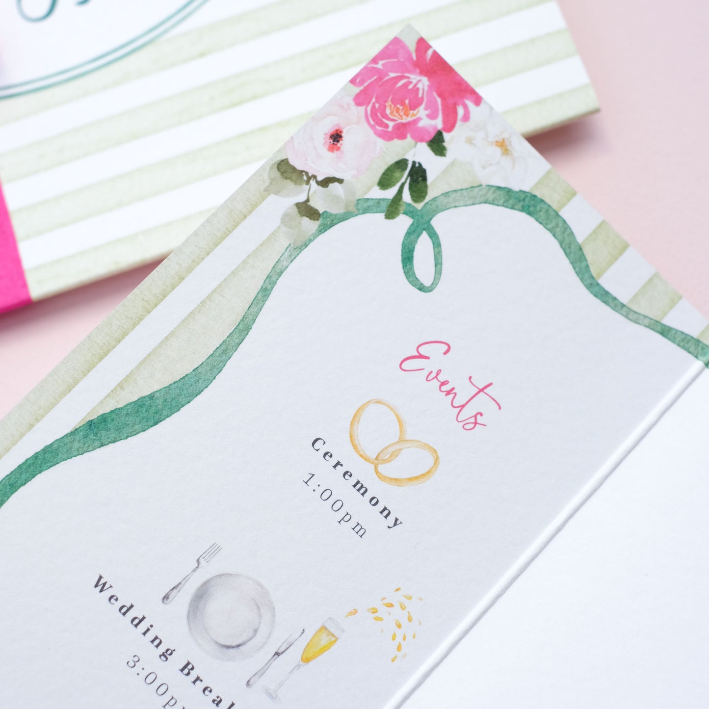 green stripe wedding invitations with large peonies, roses, snapdragons and delphiniums