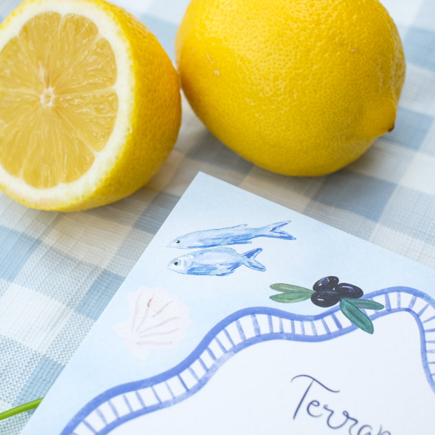 Hand painted wedding menu with fish and olives