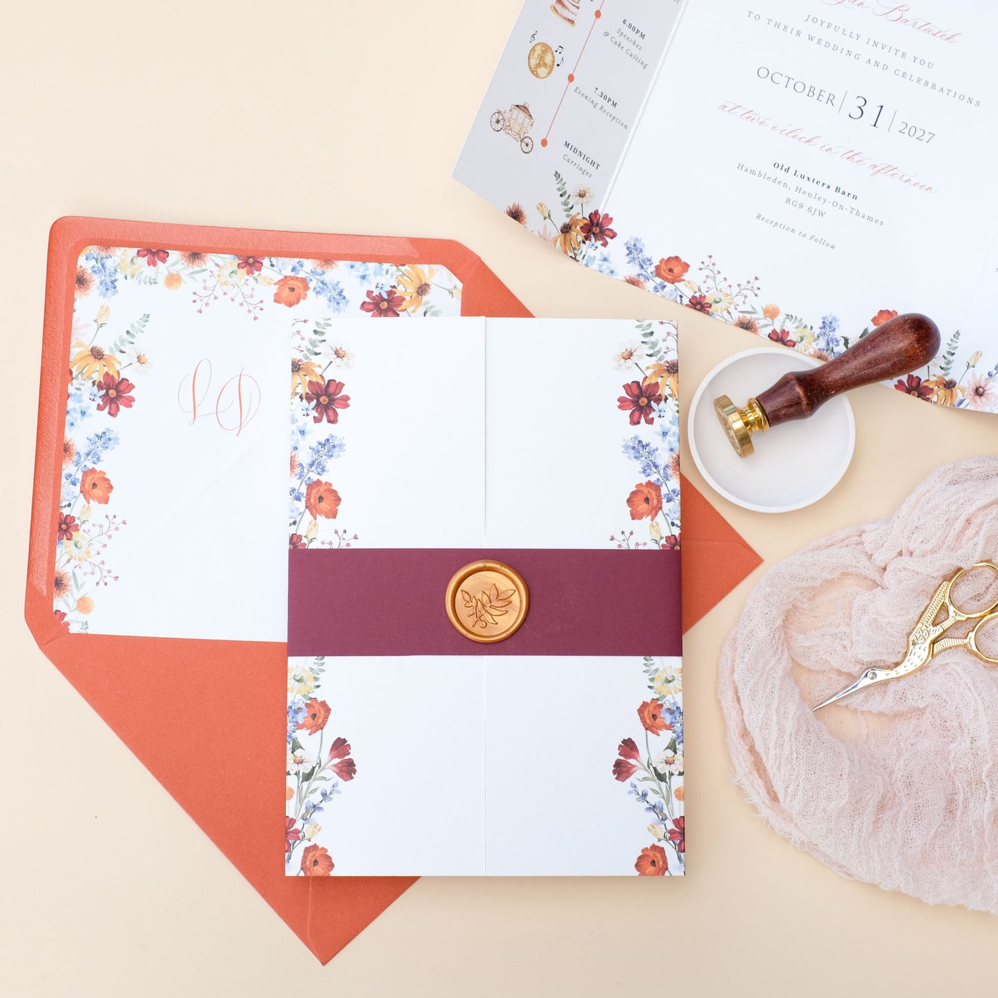 autumn wedding invitation with wildflowers and wax seal