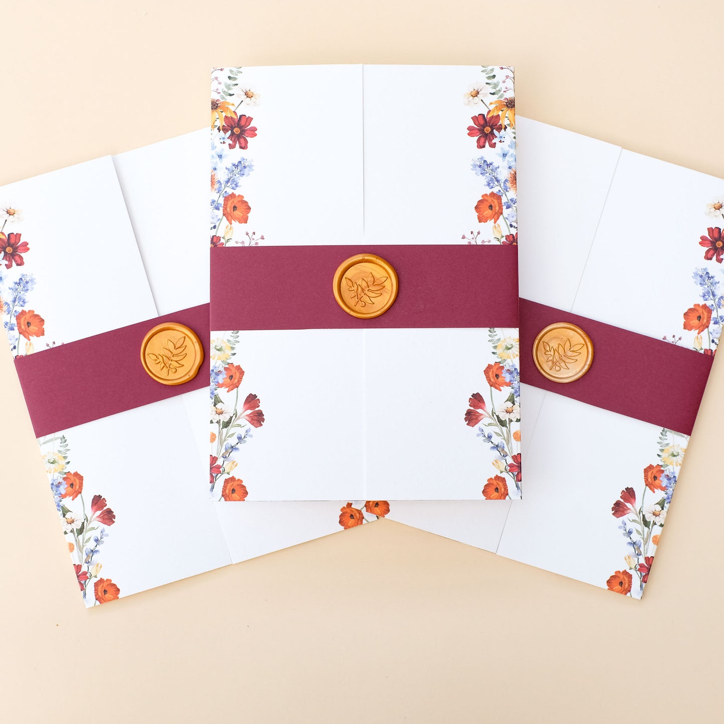 autumn wedding invitation with wildflowers and wax seal