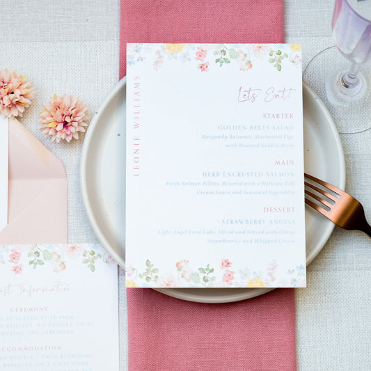 Pink floral wedding menu cusmoised with guest name