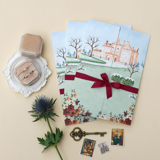 Folded wedding invitation with illustration of Sorn Castle in the snow