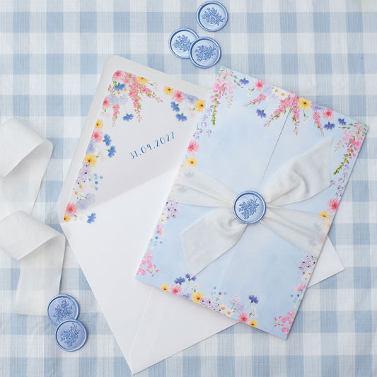 wildflower wedding invitation with ribbon and wax seal