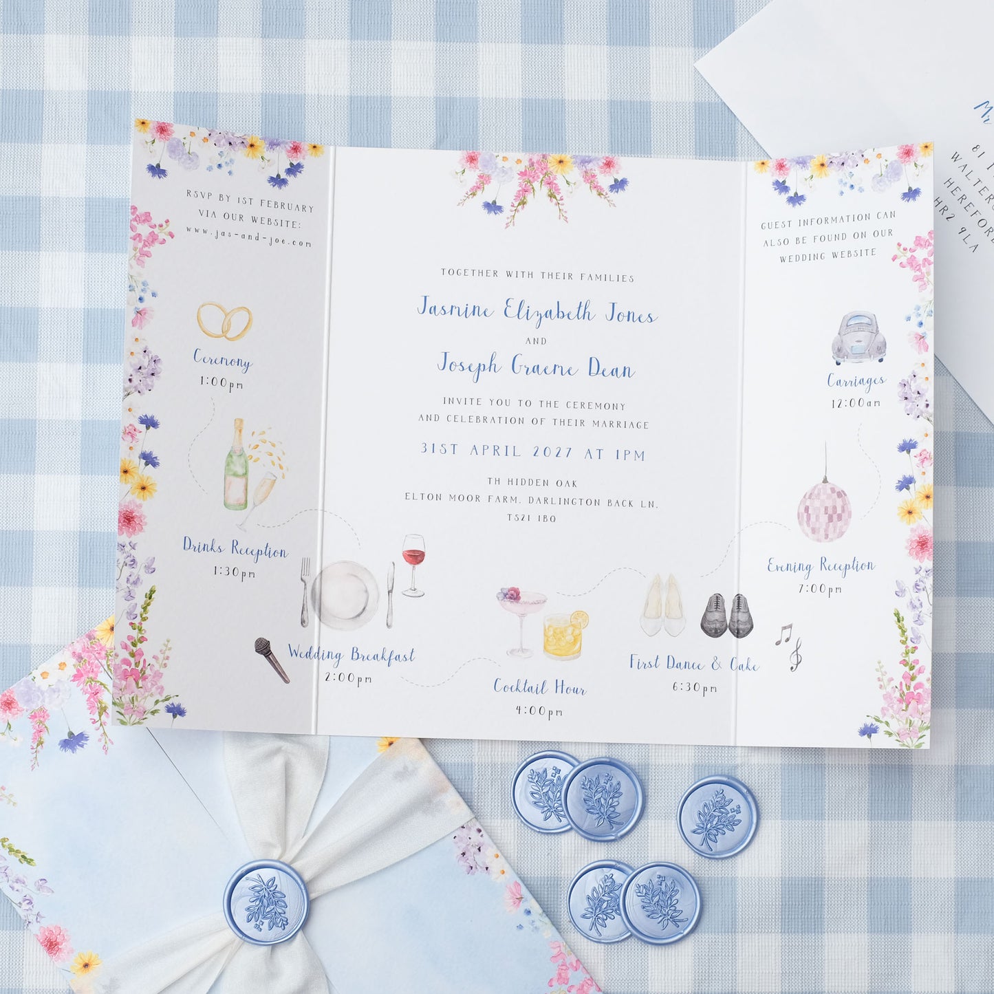 wildflower wedding invitation with ribbon and wax seal