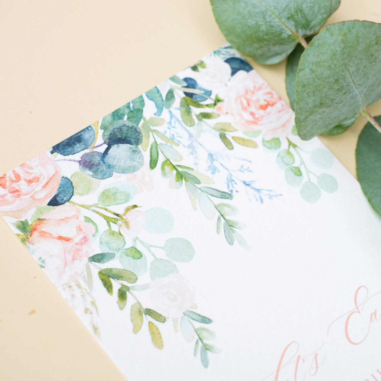 pretty watercolour wedding menu with roses and eucalyptus