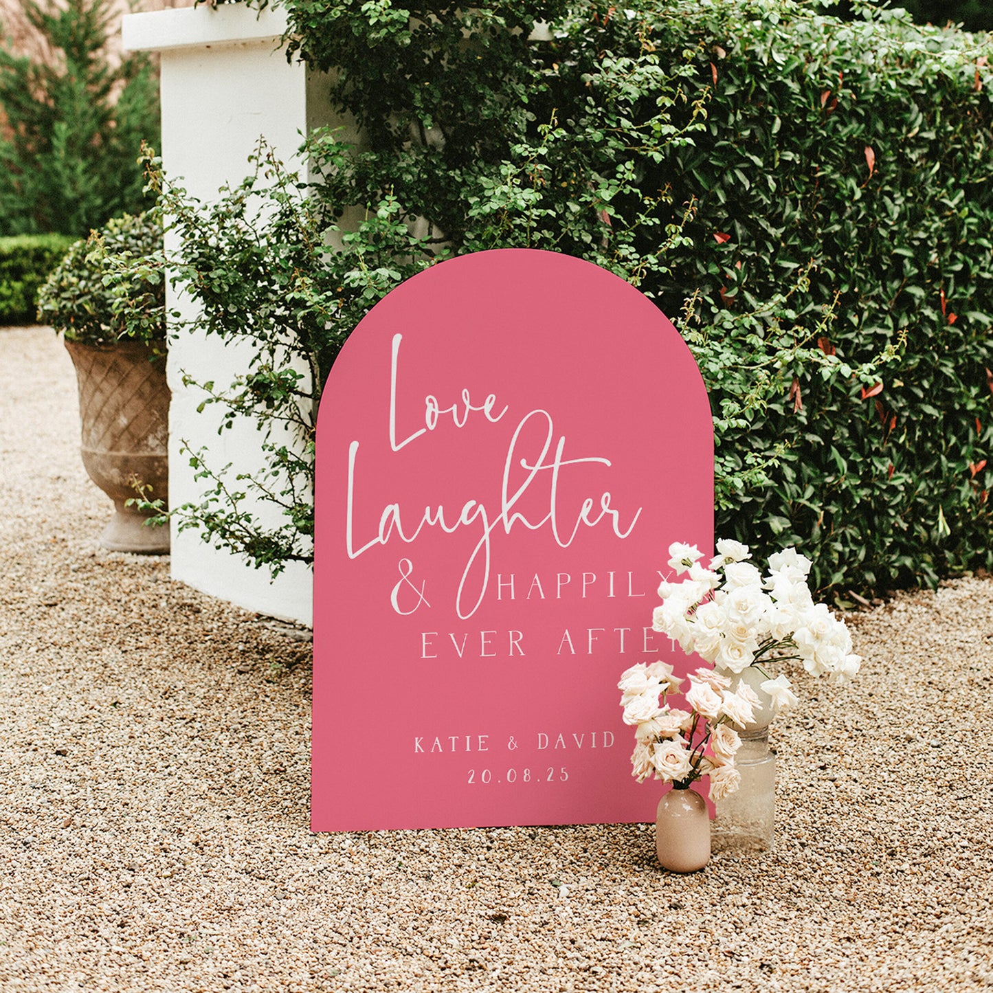 Hot pink arched wedding sign with quote